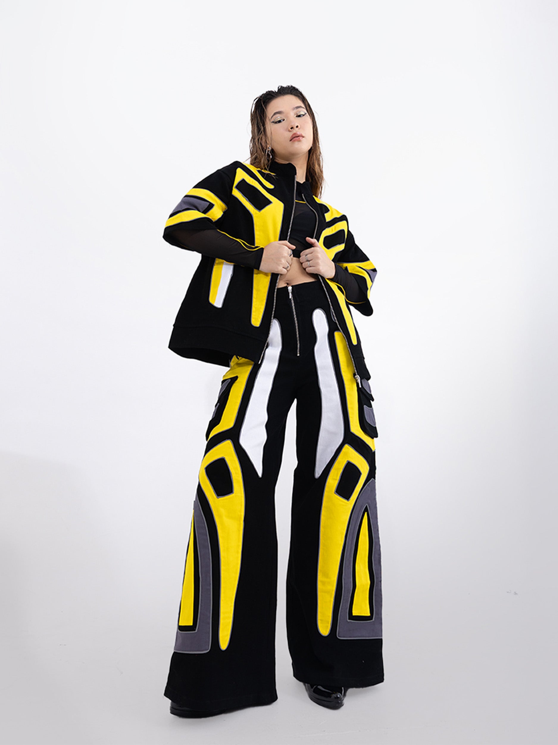 OVERDRIVE SET 0.1: Close-up of a sleek, black electronic device with a metallic silver dial and glowing blue indicator