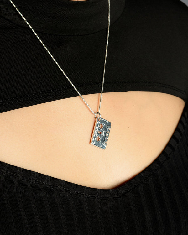 Disco Mix cassette chains, featuring a vibrant multicolor glitter effect on retro cassette tape charms.