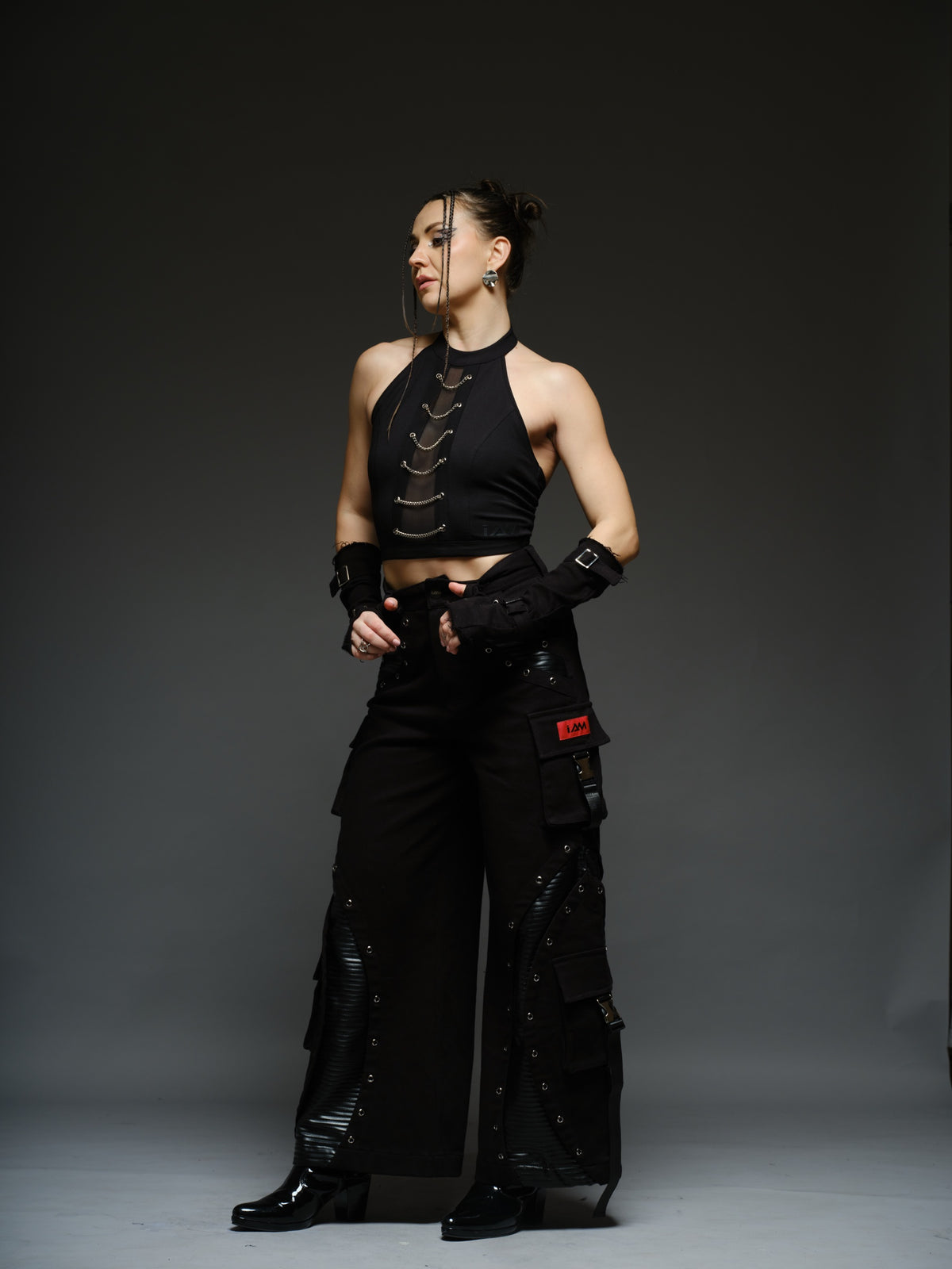 Witching Hour black halter top with a sheer centre-front mesh panel and six silver-tone chains