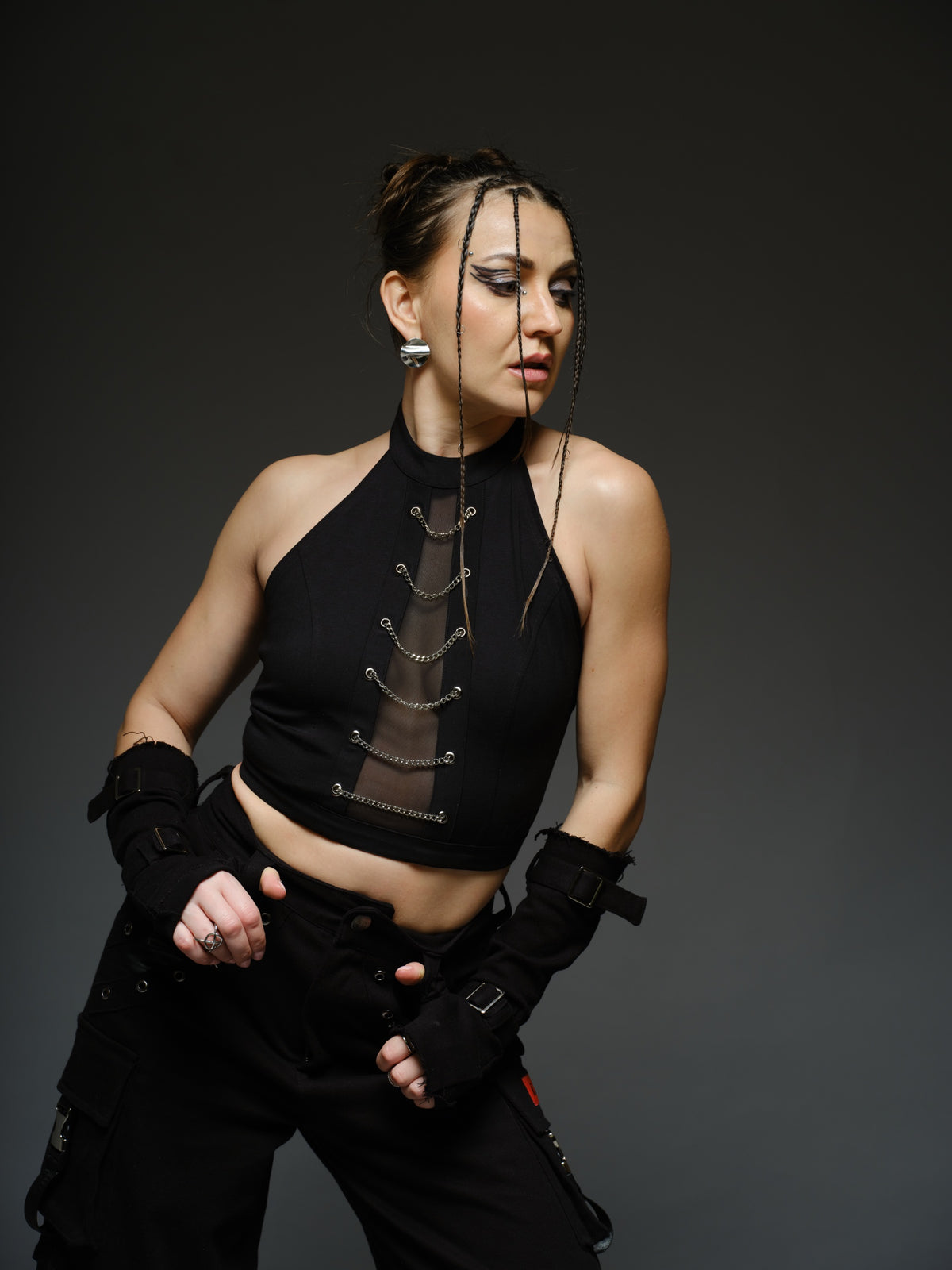 Witching Hour black halter top with a sheer centre-front mesh panel and six silver-tone chains