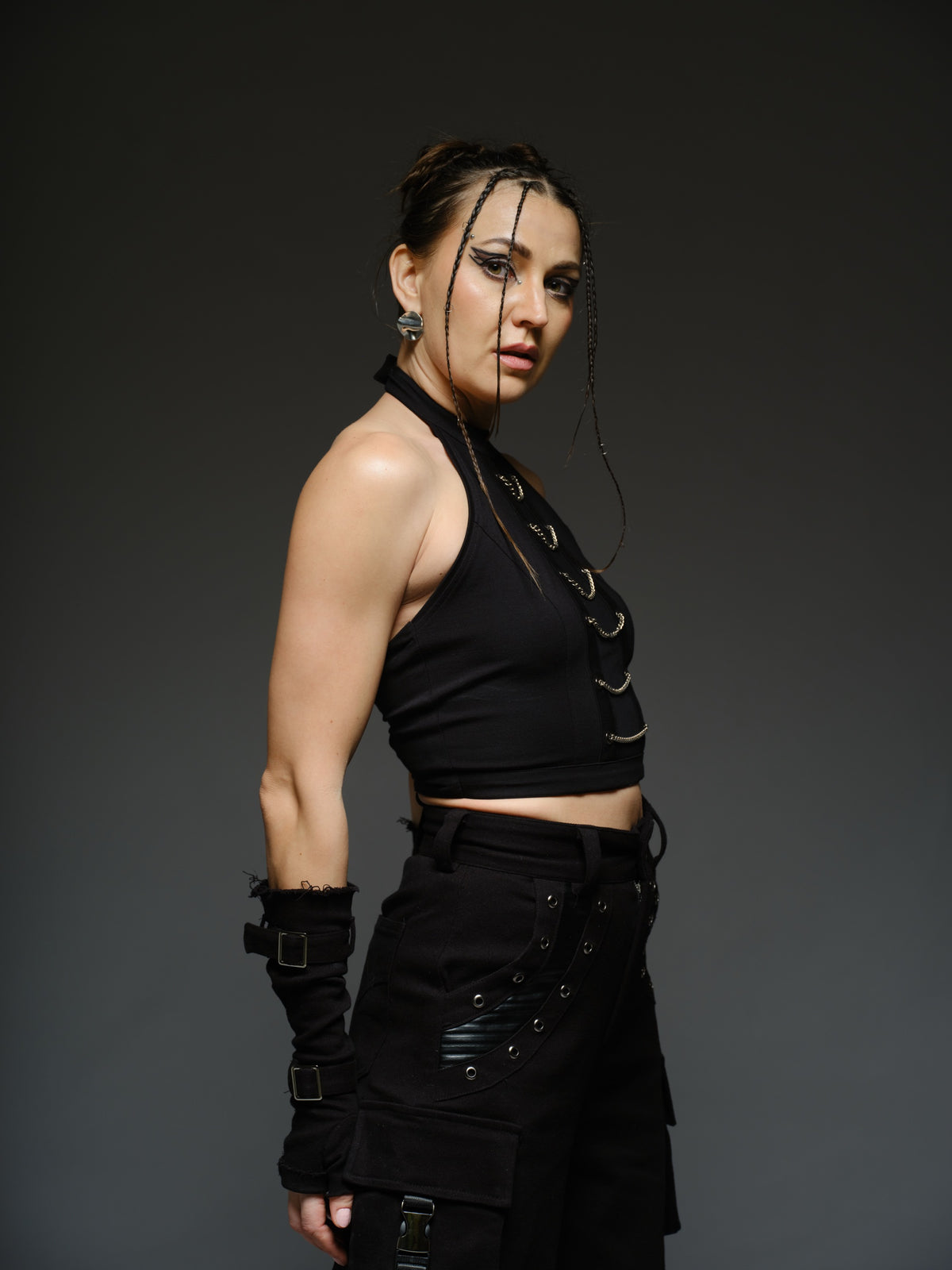 Witching Hour black halter top with a sheer centre-front mesh panel and six silver-tone chains