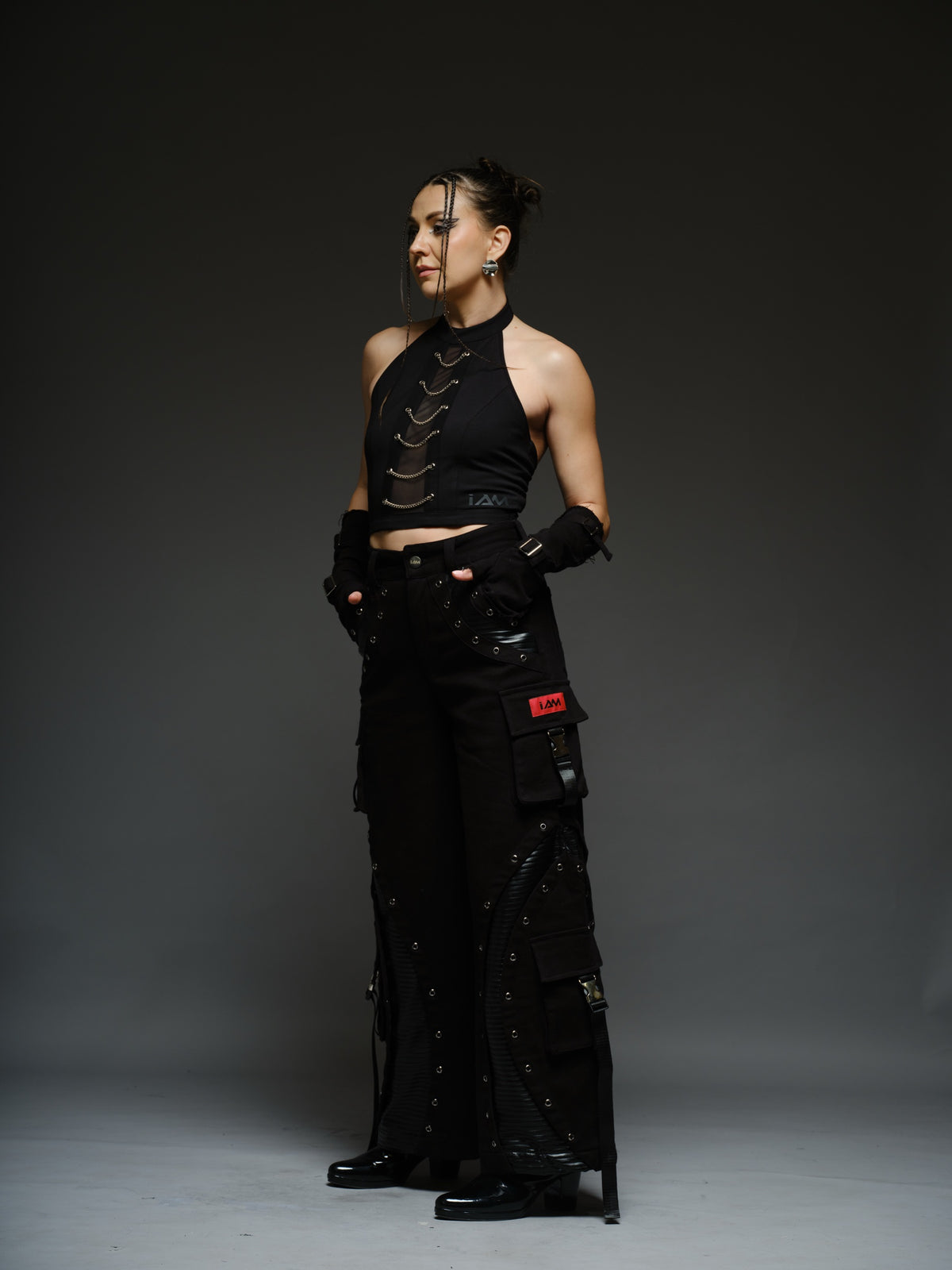 Witching Hour black halter top with a sheer centre-front mesh panel and six silver-tone chains