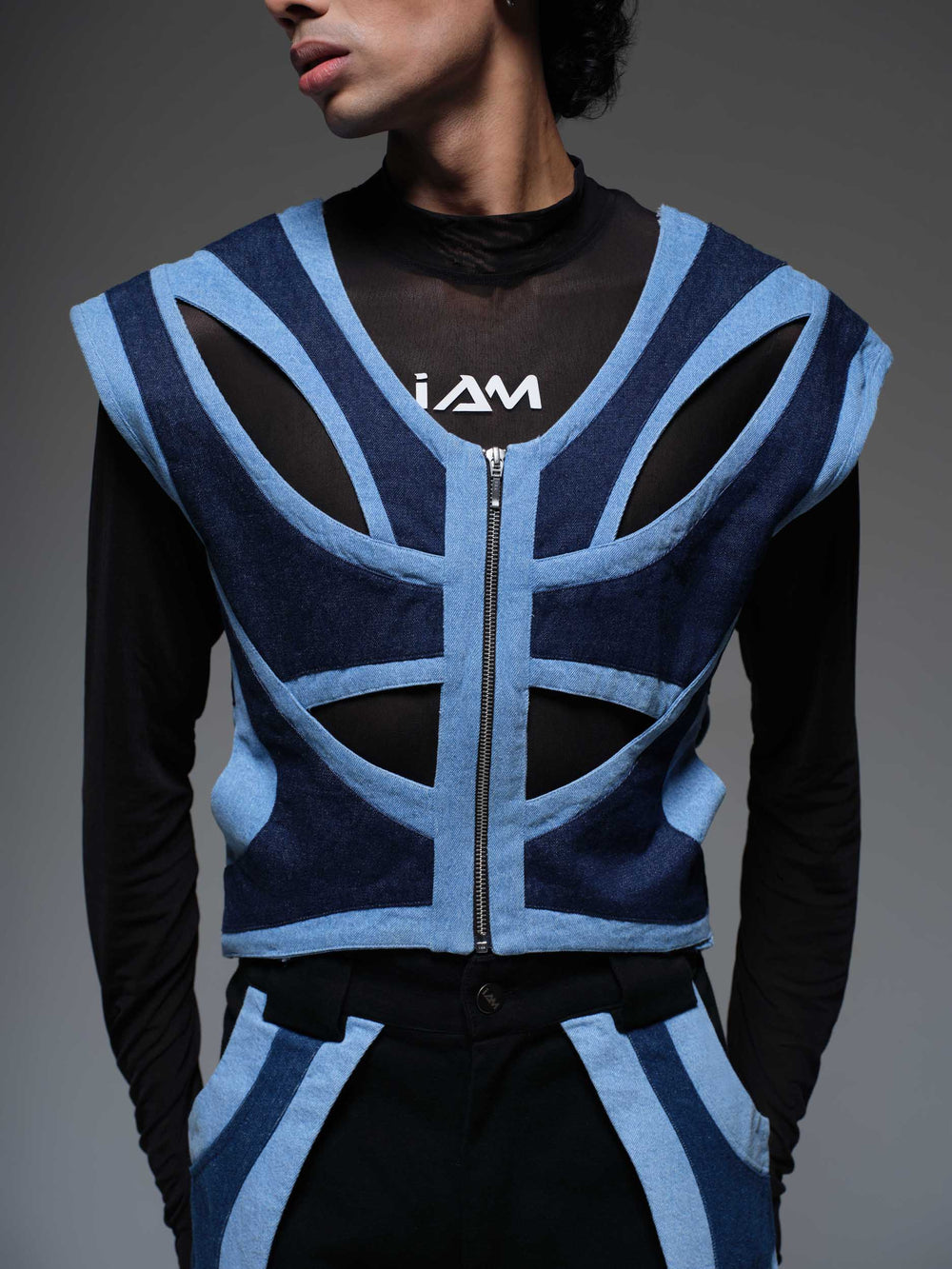 Skyline Drift Vest: a lightweight, navy blue vest with reflective accents for outdoor adventures.