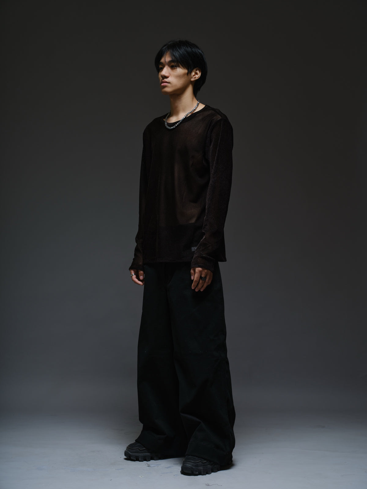 Black velvet mesh long sleeve tee with a relaxed fit, sheer finish and round neckline