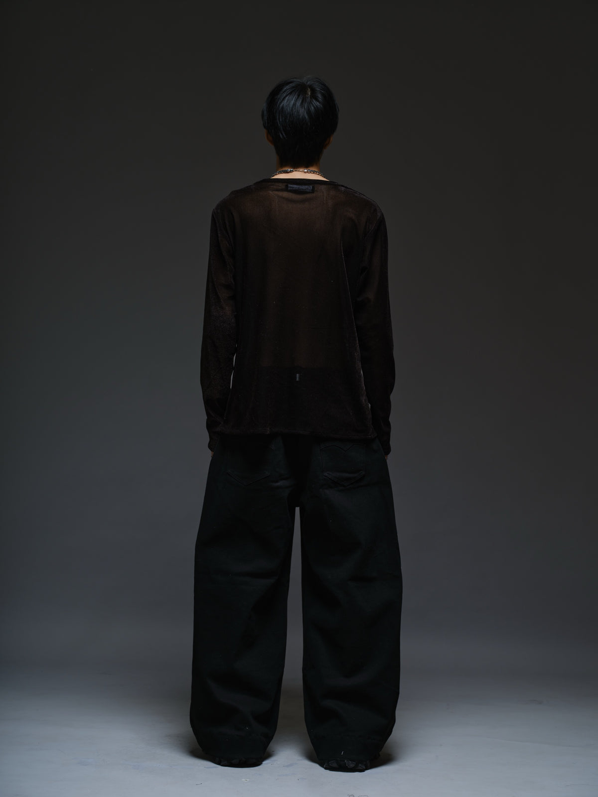 Black velvet mesh long sleeve tee with a relaxed fit, sheer finish and round neckline