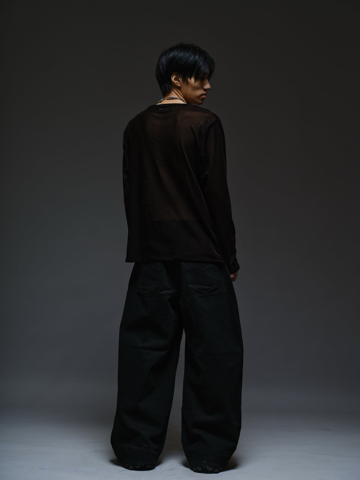 Black velvet mesh long sleeve tee with a relaxed fit, sheer finish and round neckline