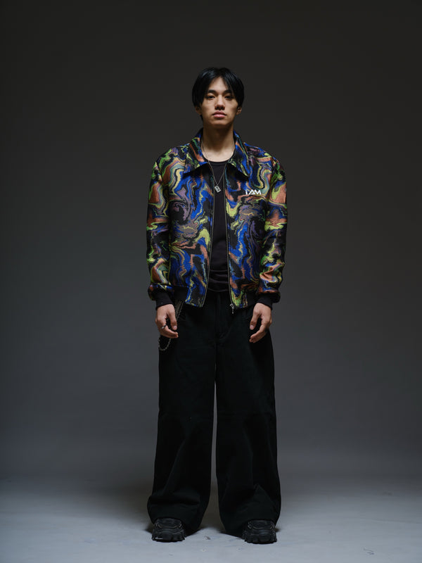 Multicoloured abstract print jacquard jacket with a pointed collar, metal front zipper, black ribbed cuffs and IAM chest branding.