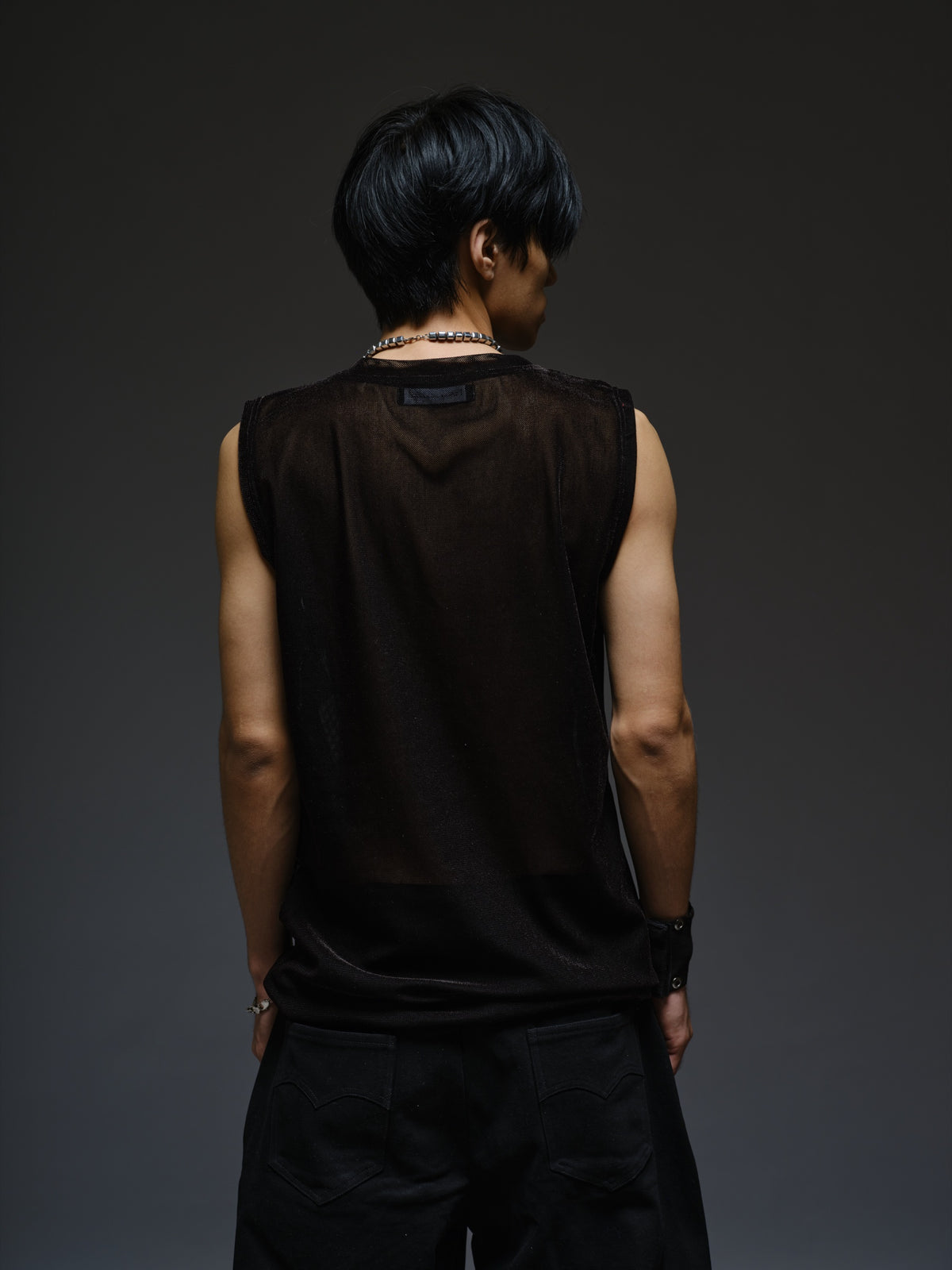 Black velvet mesh sleeveless tank with a relaxed fit, broad shoulders and a round neckline