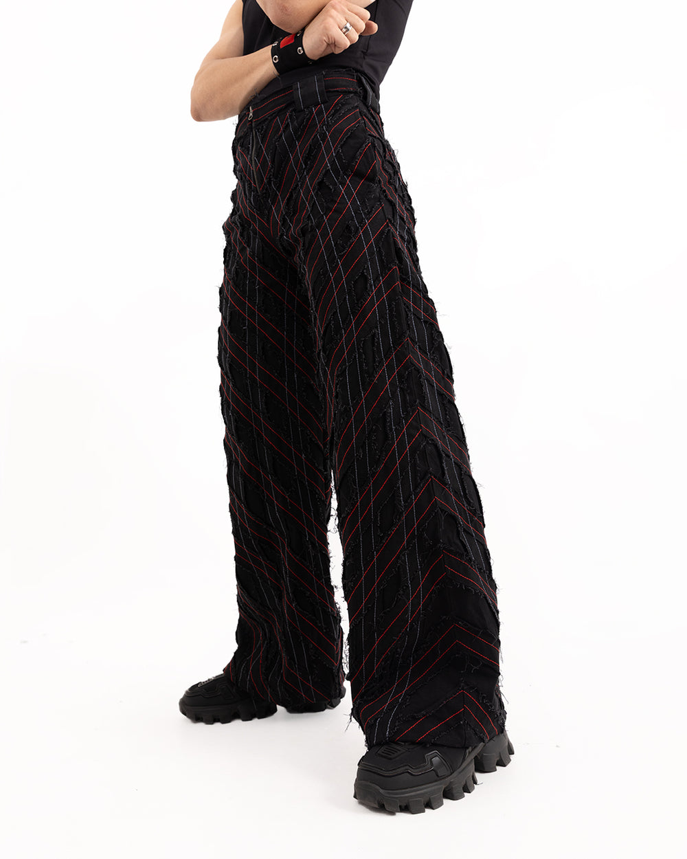 Rope Grid Pants: Black pants with a subtle rope-like grid pattern and a relaxed fit.